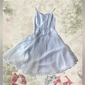 Vintage handmade Bridget Bardot dress with a corset back and bias cut bodice.